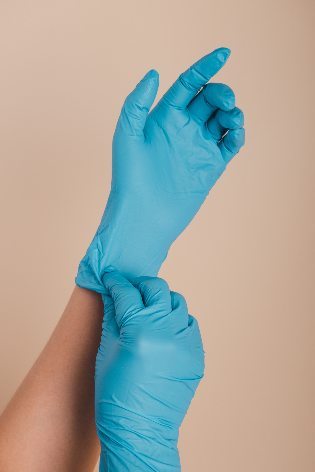 Medical nitrile gloves.Two blue surgical gloves